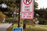 Bus Stop With Discontinued Sign