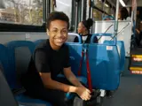 Youth riding TARTA Bus with Youth Summer Blast Pass