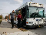 People departing a bus
