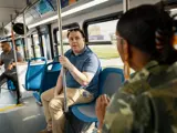 People riding the bus